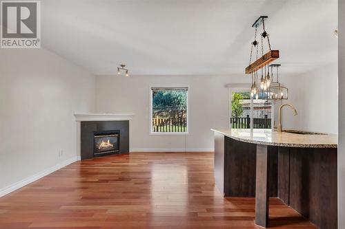 24 Tuscarora Place Nw, Calgary, AB - Indoor Photo Showing Living Room With Fireplace