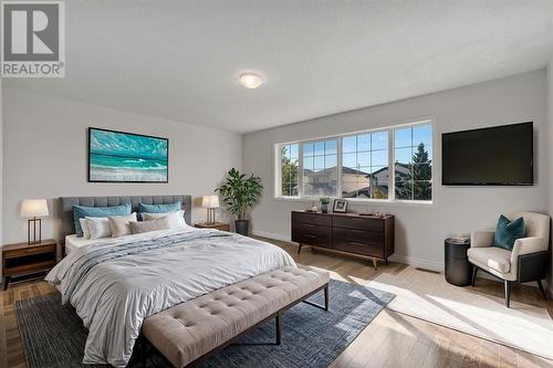 24 Tuscarora Place Nw, Calgary, AB - Indoor Photo Showing Bedroom