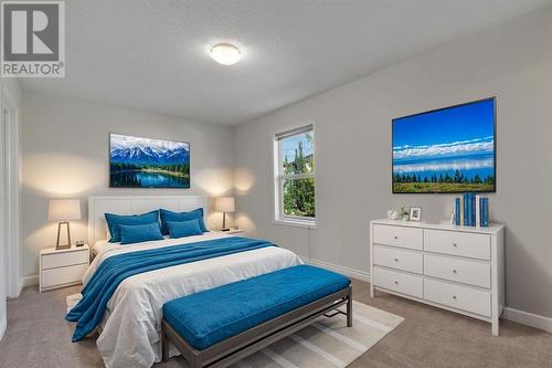 24 Tuscarora Place Nw, Calgary, AB - Indoor Photo Showing Bedroom