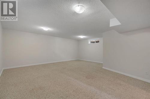 24 Tuscarora Place Nw, Calgary, AB - Indoor Photo Showing Other Room