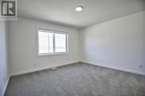 131 Legacy Reach Court Se, Calgary, AB - Indoor Photo Showing Other Room