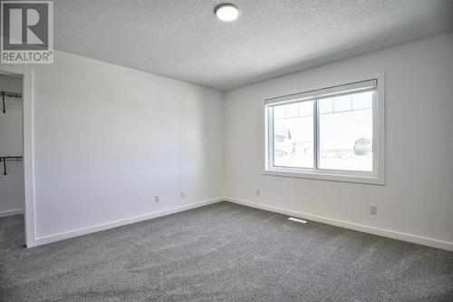 131 Legacy Reach Court Se, Calgary, AB - Indoor Photo Showing Other Room