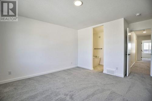 131 Legacy Reach Court Se, Calgary, AB - Indoor Photo Showing Other Room