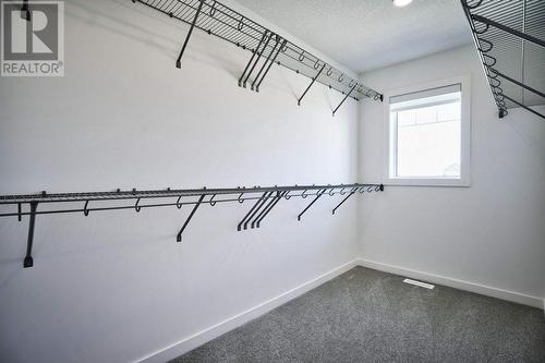 131 Legacy Reach Court Se, Calgary, AB - Indoor With Storage