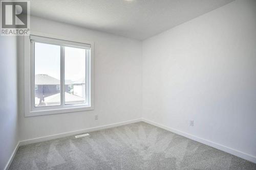 131 Legacy Reach Court Se, Calgary, AB - Indoor Photo Showing Other Room