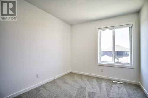 131 Legacy Reach Court Se, Calgary, AB - Indoor Photo Showing Other Room