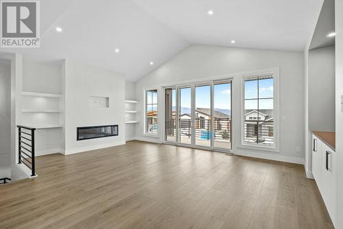 1083 Collinson Court, Kelowna, BC - Indoor Photo Showing Other Room With Fireplace