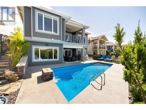 682 Peridot Court, Kelowna, BC - Outdoor With In Ground Pool With Exterior