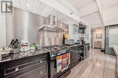 203, 1117 1 Street Sw, Calgary, AB - Indoor Photo Showing Kitchen With Upgraded Kitchen