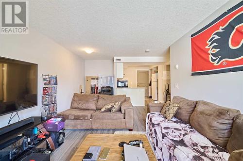 306, 1820 9, Calgary, AB - Indoor Photo Showing Living Room