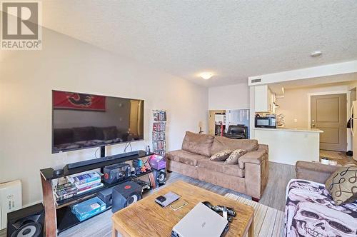 306, 1820 9, Calgary, AB - Indoor Photo Showing Living Room