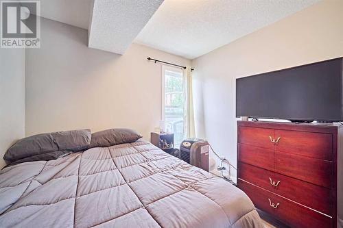 306, 1820 9, Calgary, AB - Indoor Photo Showing Bedroom