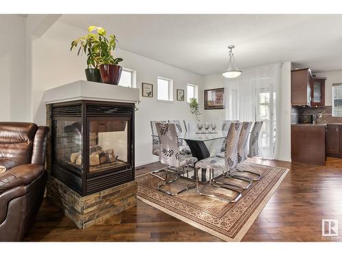 3607 13 St Nw, Edmonton, AB - Indoor Photo Showing Dining Room With Fireplace