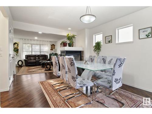 3607 13 St Nw, Edmonton, AB - Indoor Photo Showing Dining Room With Fireplace