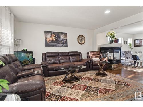 3607 13 St Nw, Edmonton, AB - Indoor Photo Showing Living Room With Fireplace