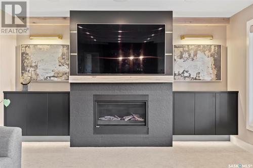 205 Greenbryre Lane, Greenbryre, SK - Indoor Photo Showing Living Room With Fireplace