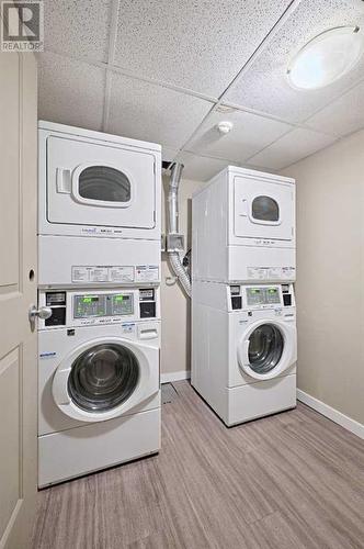 In the basement - 303, 1820 9 Street Sw, Calgary, AB - Indoor Photo Showing Laundry Room