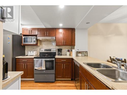 2125 Burtch Road, Kelowna, BC - Indoor Photo Showing Kitchen With Double Sink