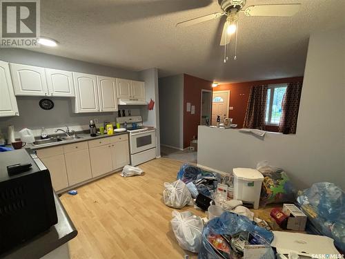 629 Lisgar Avenue, Saskatoon, SK - Indoor Photo Showing Kitchen With Double Sink