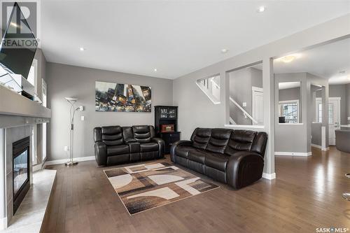 302 Pichler Crescent, Saskatoon, SK - Indoor Photo Showing Living Room With Fireplace