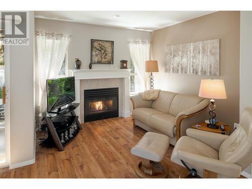 3788 Bird Place Unit# 145, Kelowna, BC - Indoor Photo Showing Living Room With Fireplace