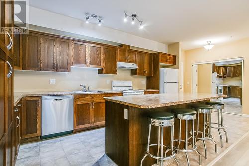 1905 Pandosy Street Unit# 108, Kelowna, BC - Indoor Photo Showing Kitchen With Double Sink