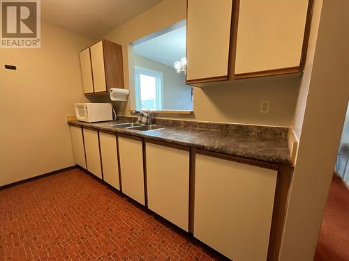 108 Spruce Avenue Unit# 218, Tumbler Ridge, BC - Indoor Photo Showing Kitchen With Double Sink