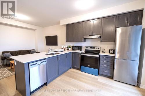 17 - 480 Beresford Path, Oshawa, ON - Indoor Photo Showing Kitchen With Stainless Steel Kitchen