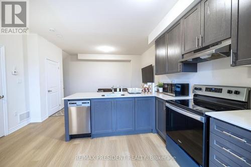 17 - 480 Beresford Path, Oshawa, ON - Indoor Photo Showing Kitchen With Stainless Steel Kitchen With Upgraded Kitchen