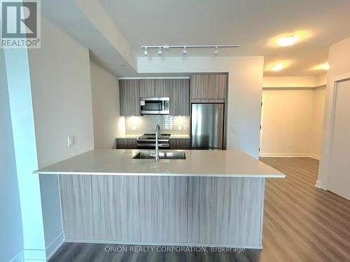 602 - 4130 Parkside Village Drive, Mississauga, ON - Indoor Photo Showing Kitchen With Stainless Steel Kitchen With Double Sink