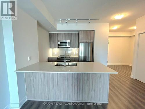 602 - 4130 Parkside Village Drive, Mississauga, ON - Indoor Photo Showing Kitchen With Stainless Steel Kitchen With Double Sink