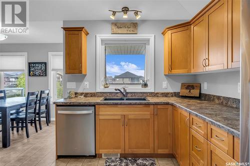 616 Thiessen Street, Warman, SK - Indoor Photo Showing Kitchen With Double Sink