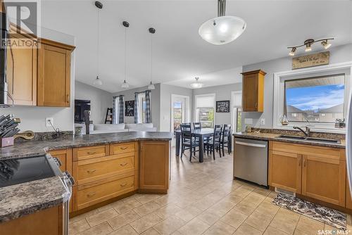 616 Thiessen Street, Warman, SK - Indoor Photo Showing Kitchen With Double Sink