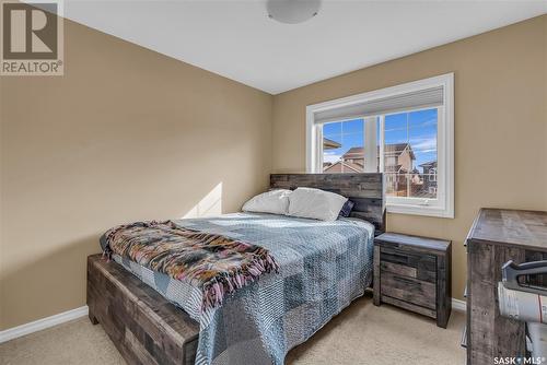 616 Thiessen Street, Warman, SK - Indoor Photo Showing Bedroom