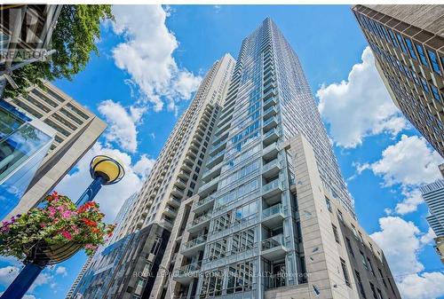 2302 - 21 Balmuto Street, Toronto, ON - Outdoor With Balcony With Facade