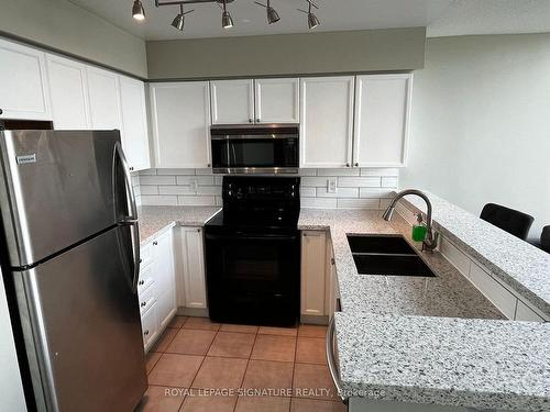 714-250 Manitoba St, Toronto, ON - Indoor Photo Showing Kitchen With Double Sink