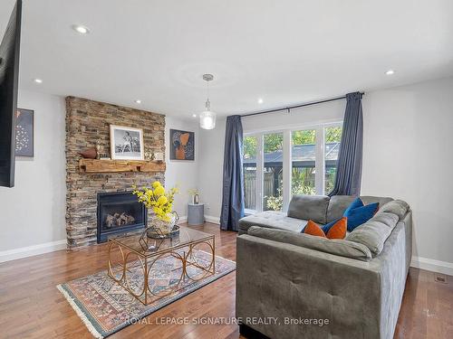 956 Huffman Cres, Milton, ON - Indoor Photo Showing Living Room With Fireplace