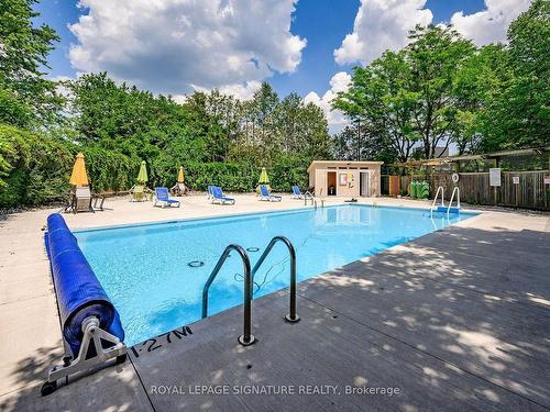 307-93 Westwood Rd, Guelph, ON - Outdoor With In Ground Pool With Backyard