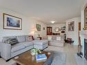 108-1436 Harrison St, Victoria, BC  - Indoor Photo Showing Living Room With Fireplace 