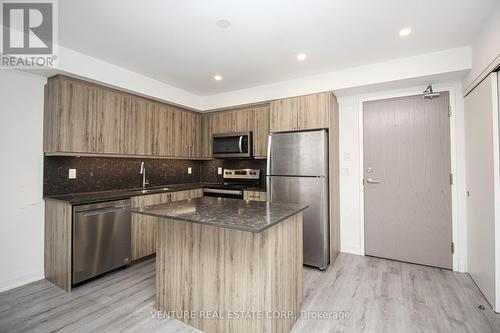 308 - 58 Lakeside Terrace, Barrie, ON - Indoor Photo Showing Kitchen With Stainless Steel Kitchen