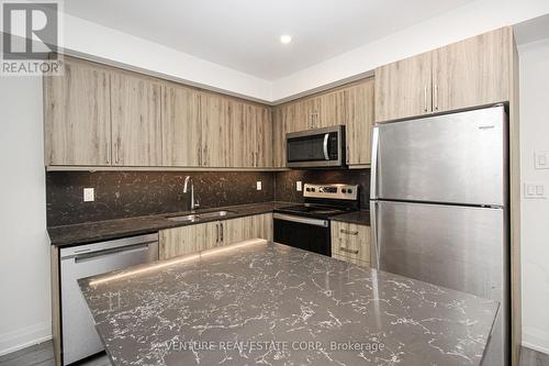 308 - 58 Lakeside Terrace, Barrie, ON - Indoor Photo Showing Kitchen With Stainless Steel Kitchen