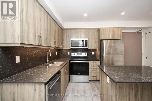 308 - 58 Lakeside Terrace, Barrie, ON - Indoor Photo Showing Kitchen With Stainless Steel Kitchen With Double Sink