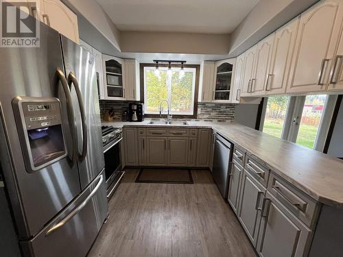 5116 Sunset Drive, Fort Nelson, BC - Indoor Photo Showing Kitchen With Double Sink