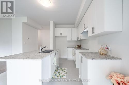 119 Oakmont Drive, Loyalist, ON - Indoor Photo Showing Kitchen With Double Sink With Upgraded Kitchen