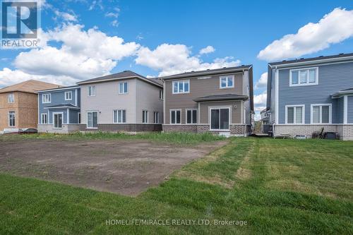 119 Oakmont Drive, Loyalist, ON - Outdoor With Facade