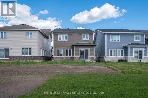 119 Oakmont Drive, Loyalist, ON - Outdoor With Facade