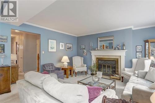 32 Country Club Place, Brockville, ON - Indoor Photo Showing Living Room With Fireplace