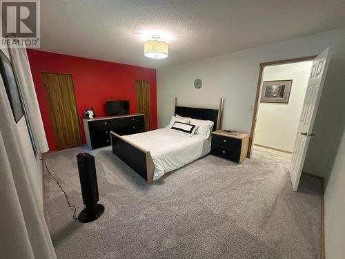 118 Weeks Road, Genelle, BC - Indoor Photo Showing Bedroom