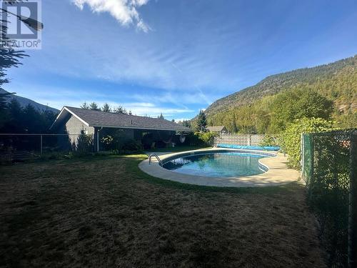 118 Weeks Road, Genelle, BC - Outdoor With In Ground Pool