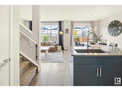 15184 25 St Nw, Edmonton, AB - Indoor Photo Showing Kitchen With Double Sink